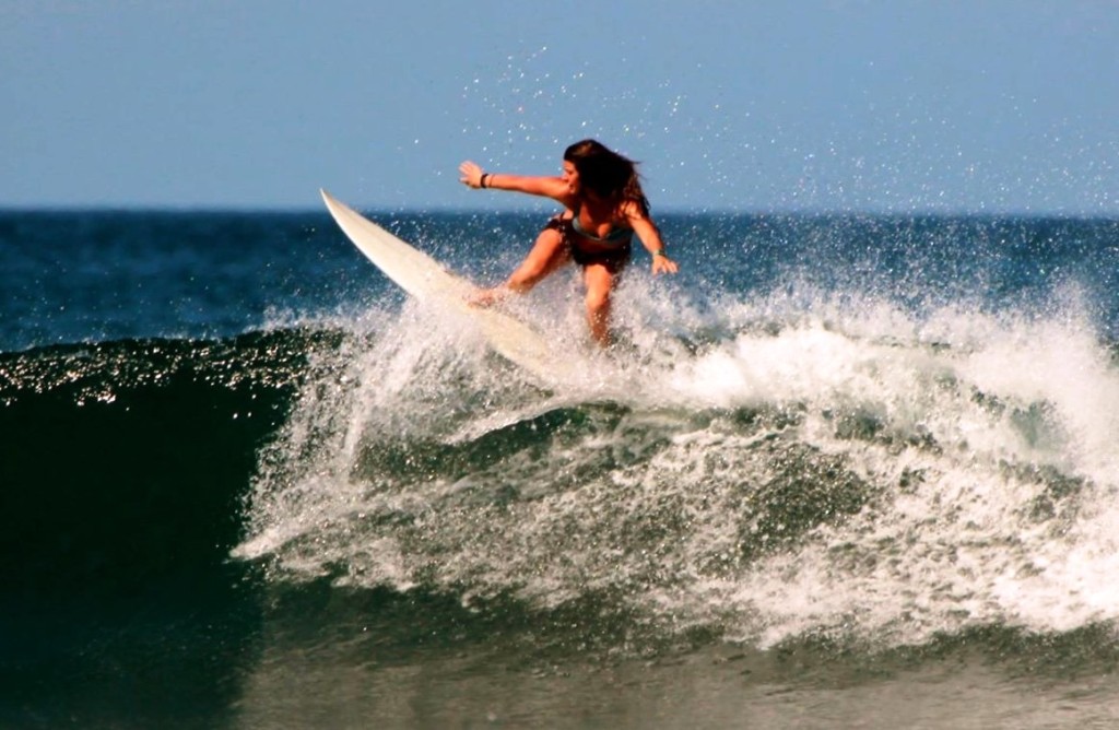 CCMag surfer, Abby Taylor, catching a some waves just a few minutes of the Surf Costa property.